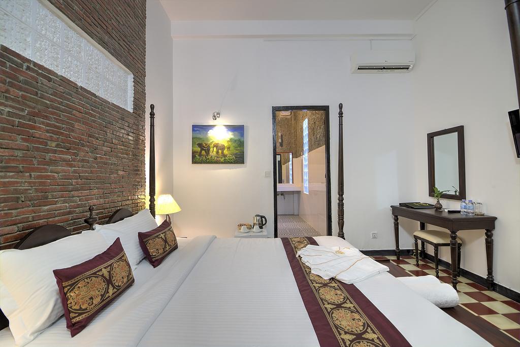 Prasats Boutique Hotel Phnom Penh Rum bild